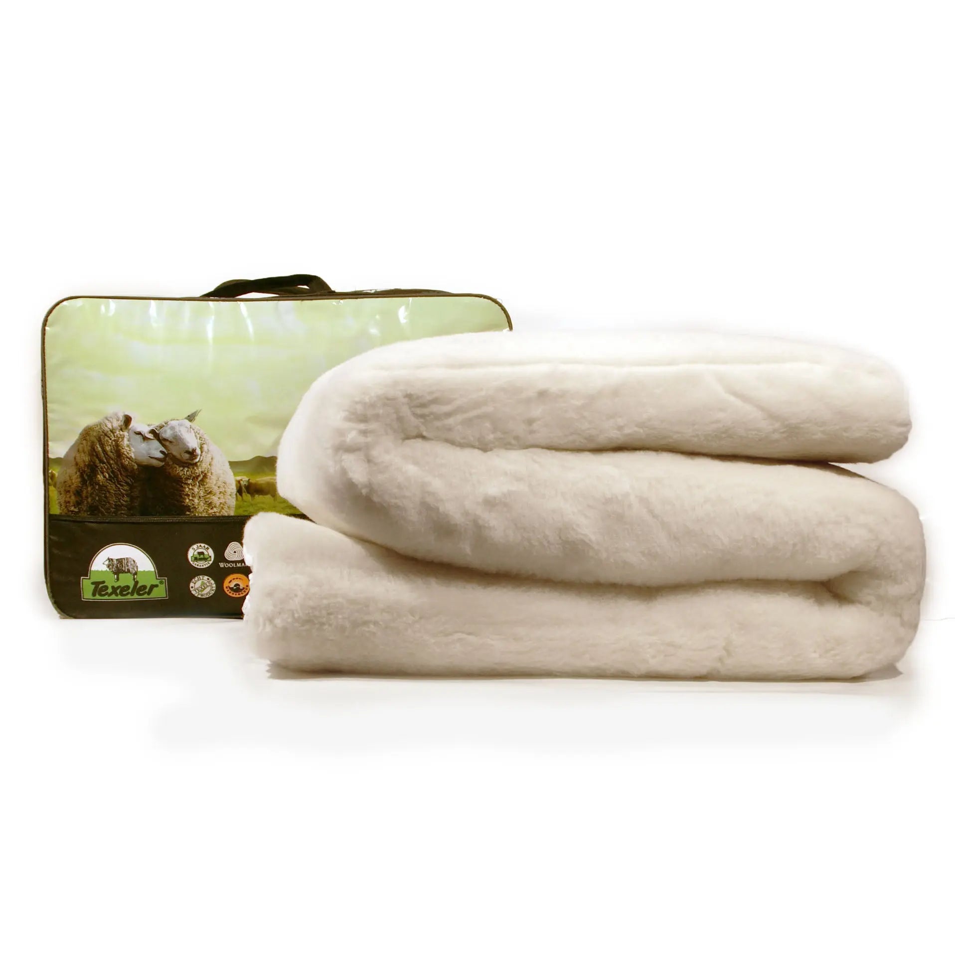A folded beige futon mattress enhancer with a wool and cashmere top layer, displayed alongside its packaging that features an image of sheep on a green landscape. brand name Texeler 