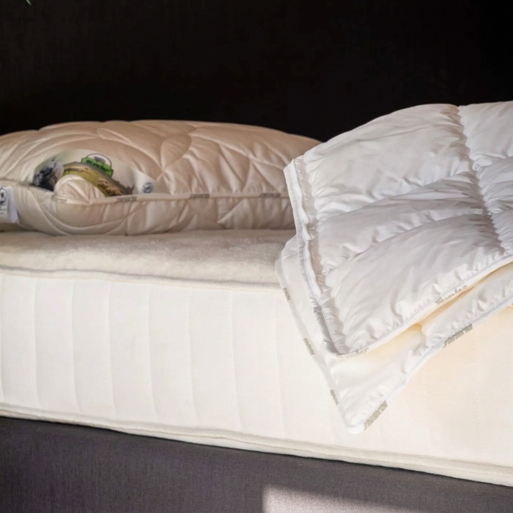bed shot with warmwool texeler pillow and duvet